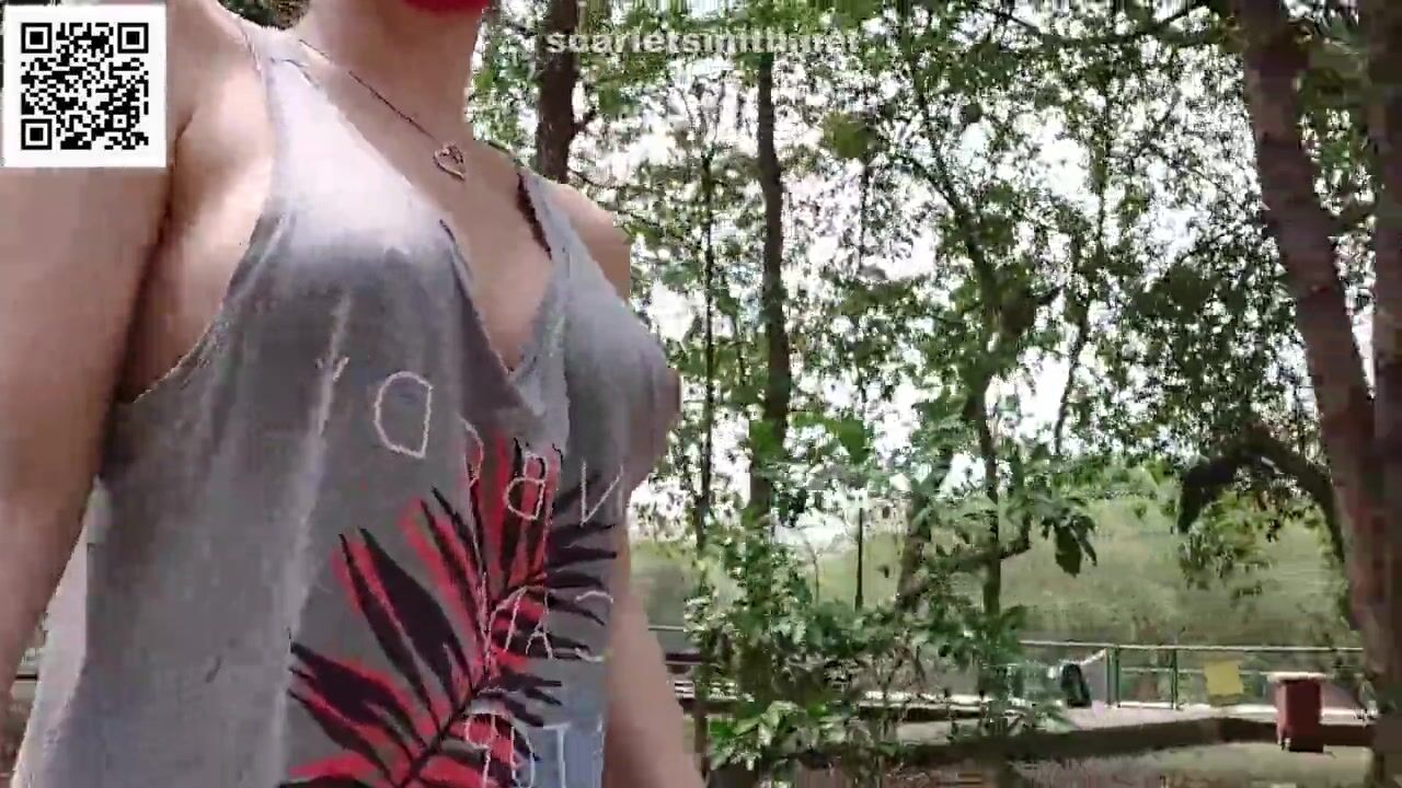 Inside a t-shirt and without a bra into the park