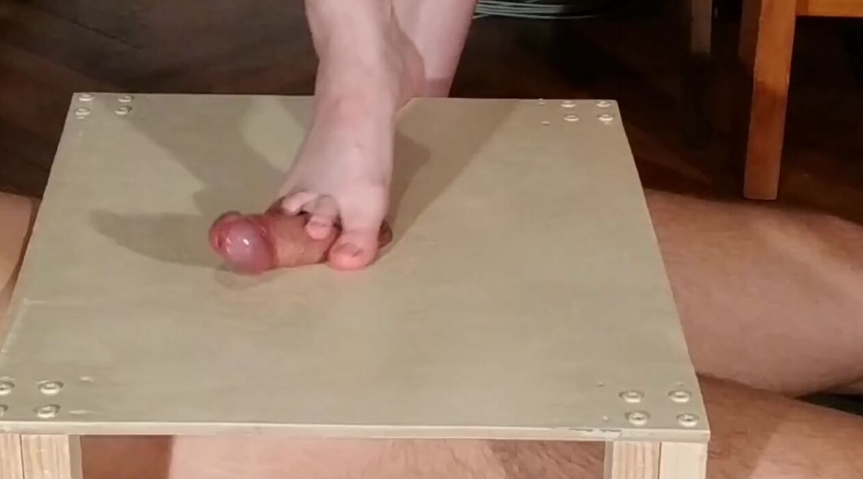 Dominatrix bare foot penis stomping & toejob pt1
