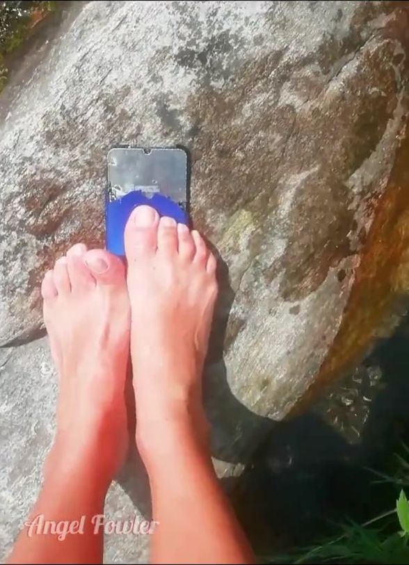 Traveler women Crushing the Phone with Foot and Throwing into the Water