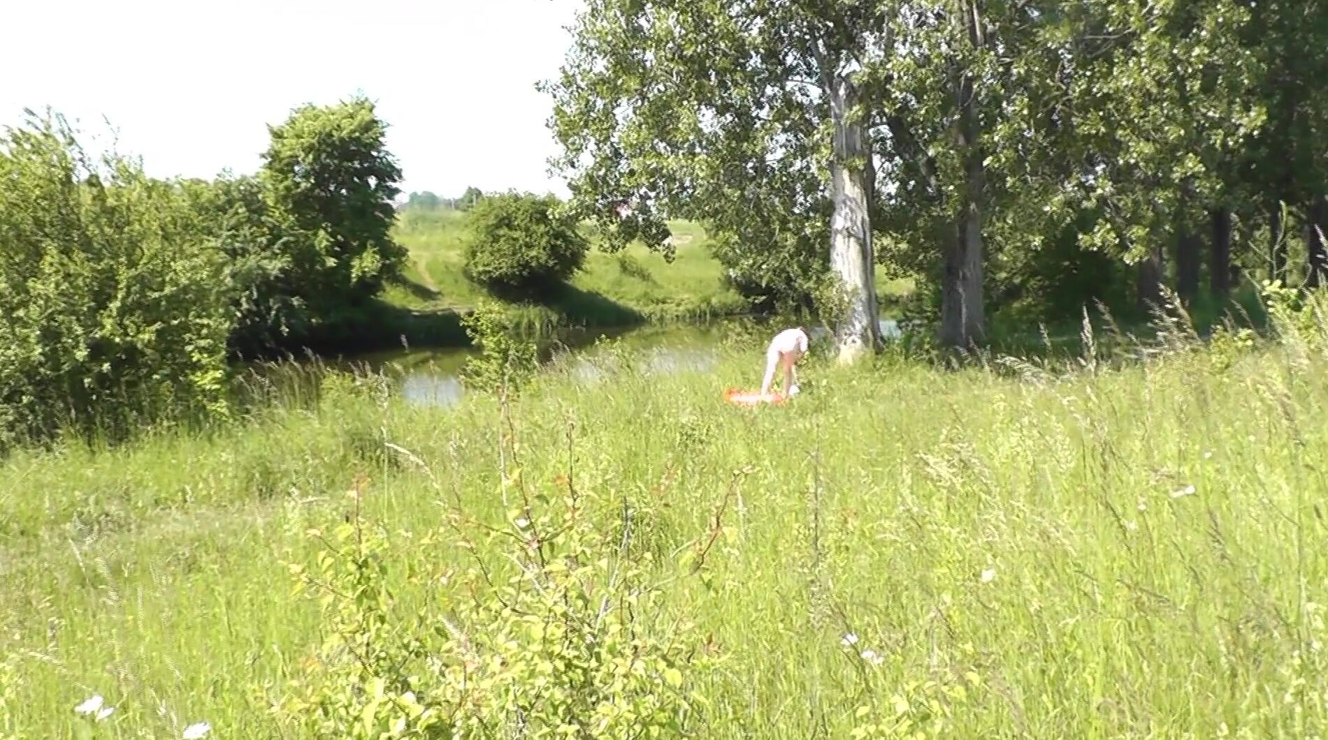 Public. Wild Beach. Random Passerby Man by River saw Nude Woman Sunbathing.