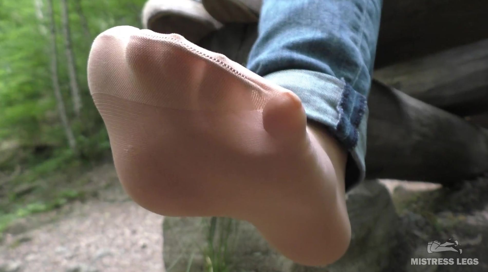 Jeans Foot inside Nylon Socks inside the Forest