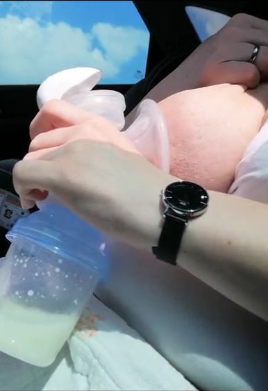 Pumping my gigantic milk breasts empty inside the vehicle