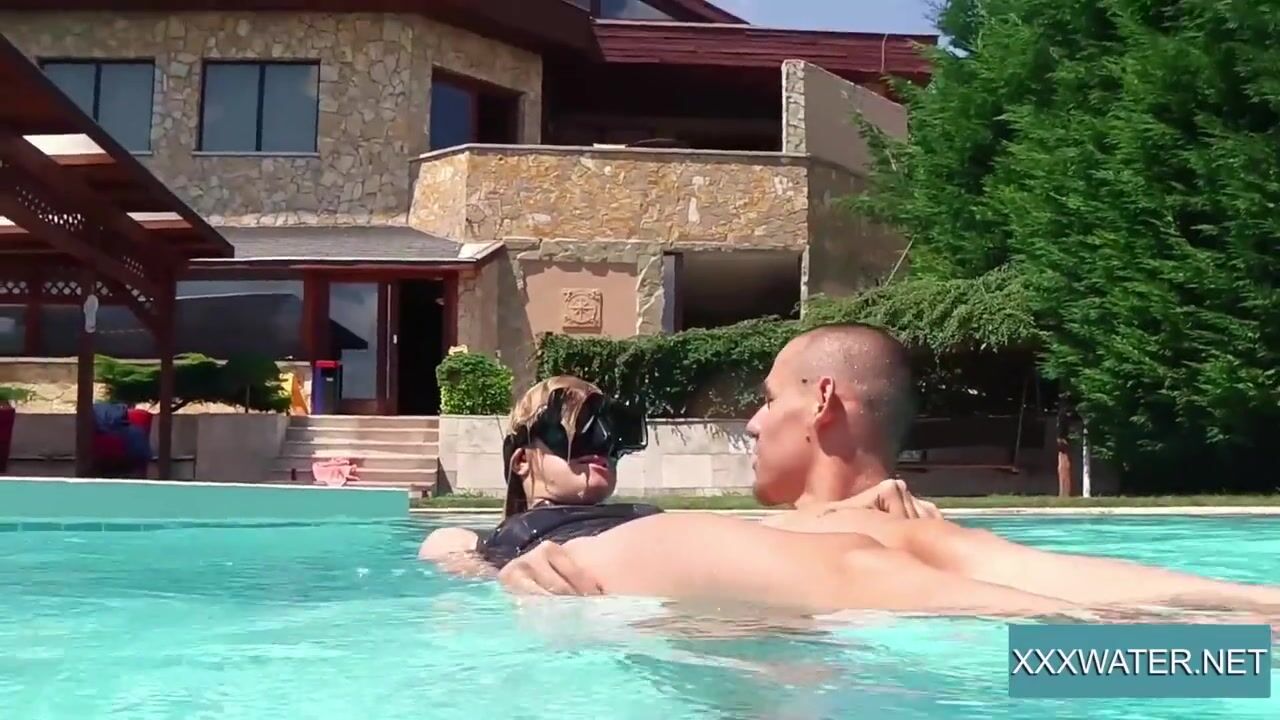 Young Hot Marcie blows on long penis into the pool