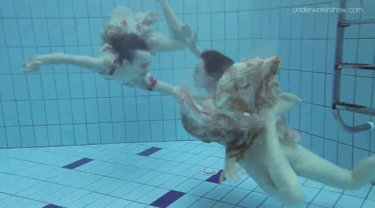2 clothed beauties underwater Anna Netrebko and Lada Poleshuk