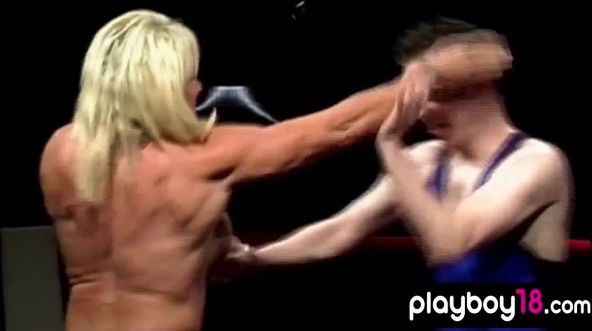 Muscular big titted blonde older beating a bro inside the boxing ring