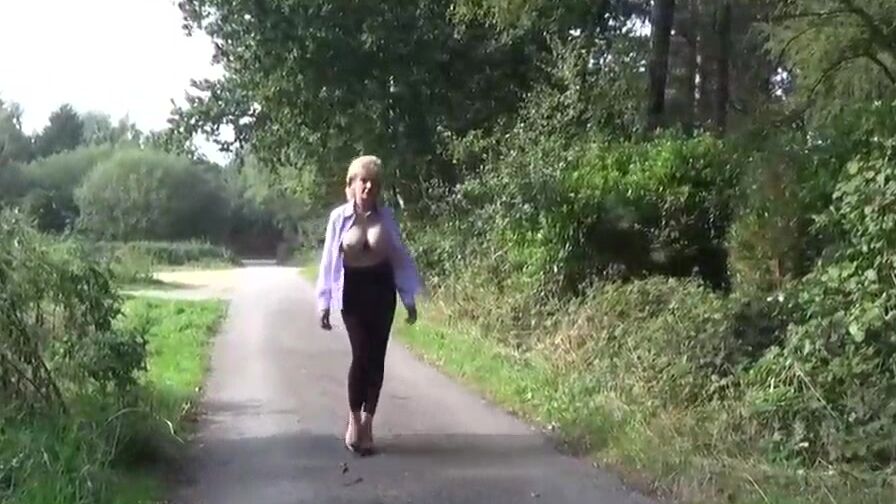 Lady Sonia flashing then masturbates into the forest