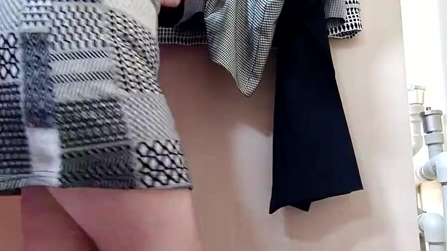 OMG! Russian mommy trying on skirts inside a fitting room