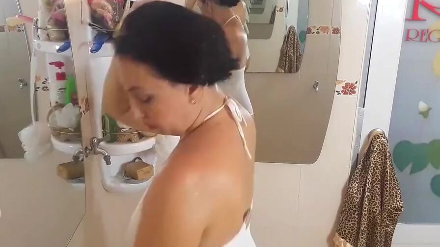 Lady shaves her armpits shower room, lathers her body one-three