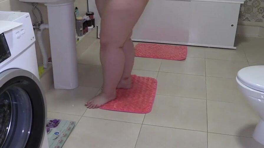 A older bbw with a perfect booty into lingerie washes the floor