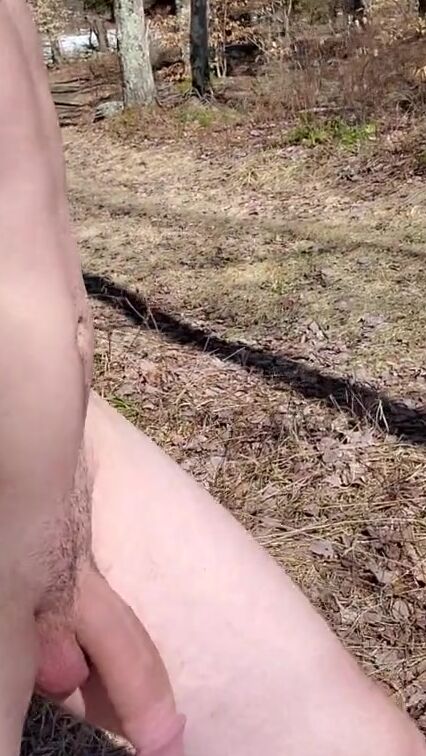 Huge cock boy swinging dick around inside the sunlight on naked hike