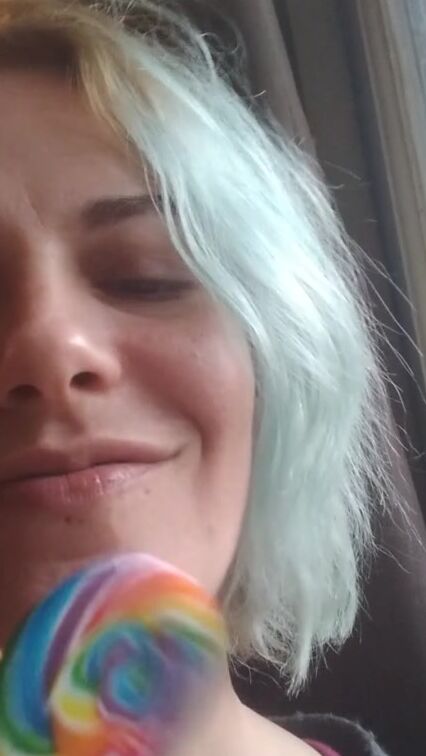 Blue haired sluts licks and blows lollipop