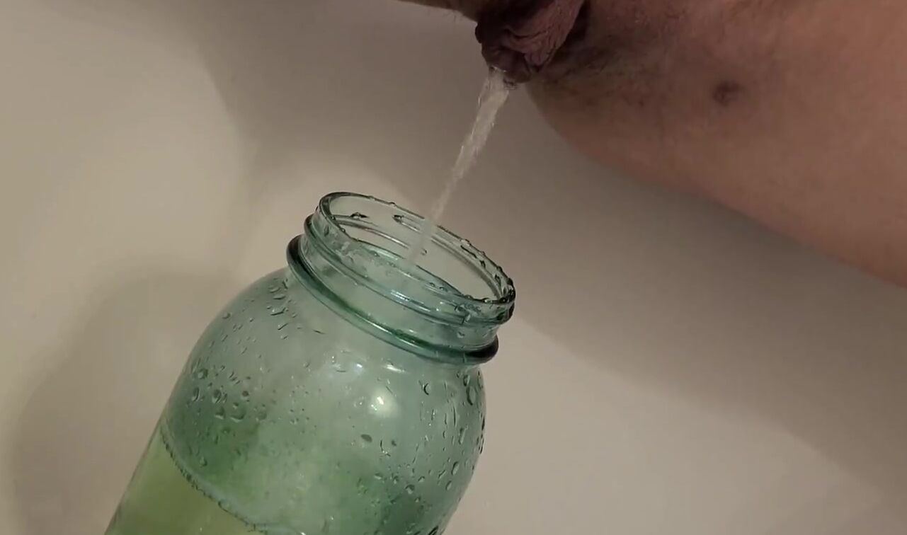 cunt with mouth Pees inside a Mason Jar & Almost Fills it up!