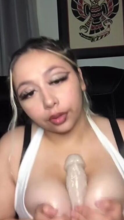 Bunny tittyfucks gigantic sex toy with her huge natural titties