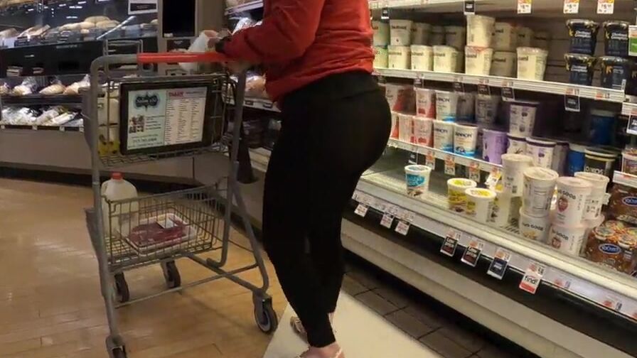 Cougar grocery shopping inside transparent pants