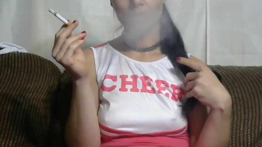 smoking cheerleader eye contact while smoking ciggy