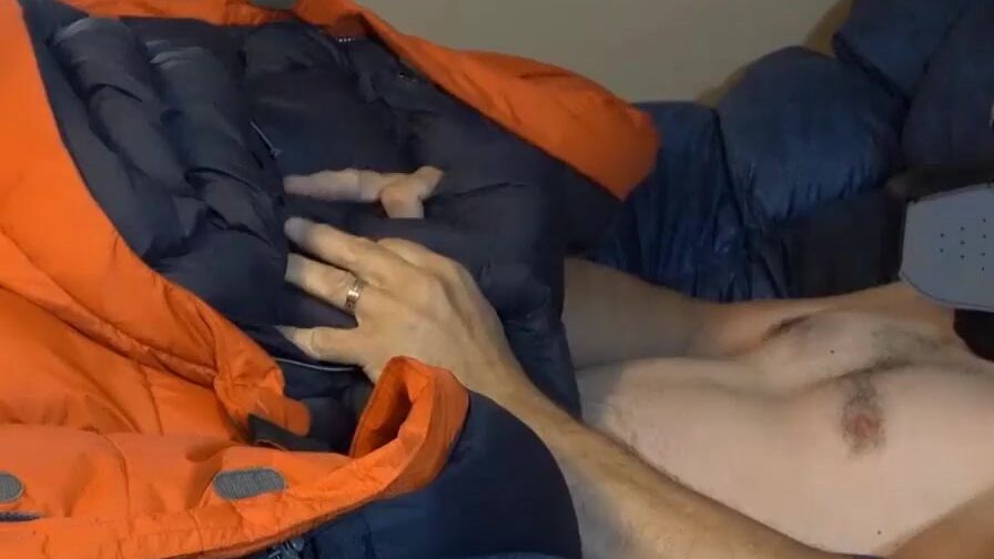 Humping Huge Orange Parka On Puffy Bed Of Down