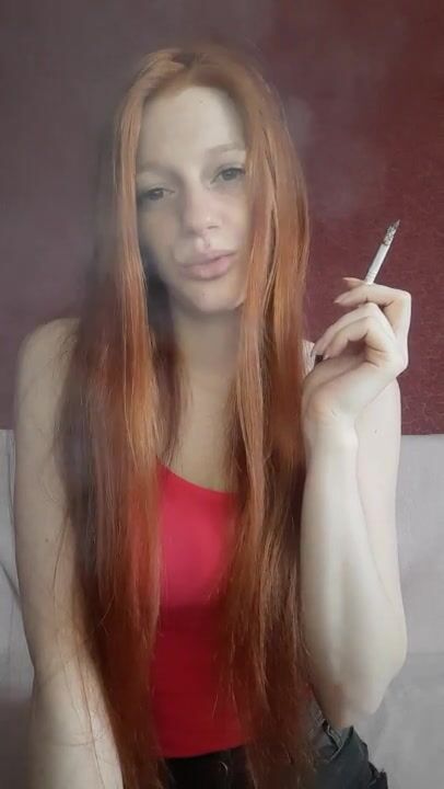 cunt with mouth with Red Hair Smokes a Cigarette