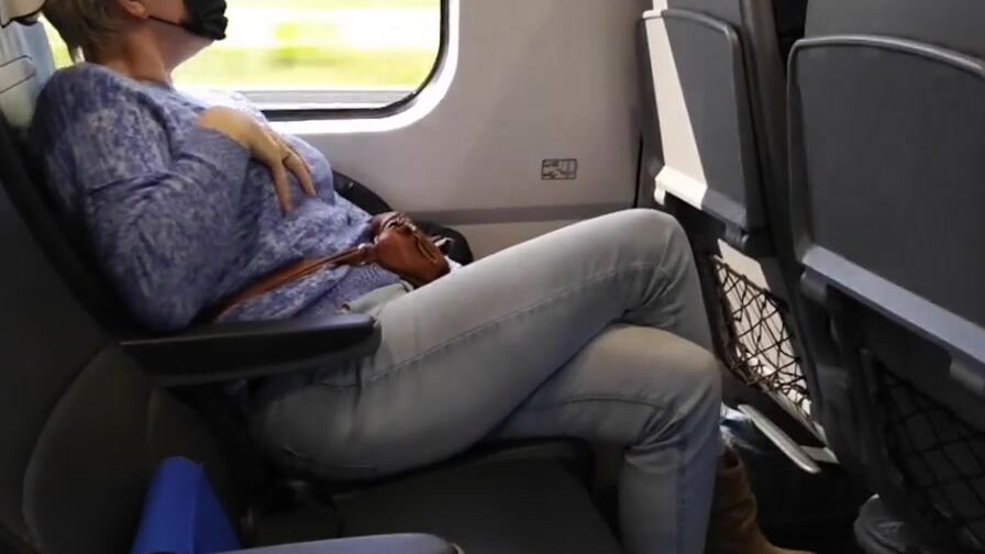 Freaky cougar get her crossed legs orgasm on a train