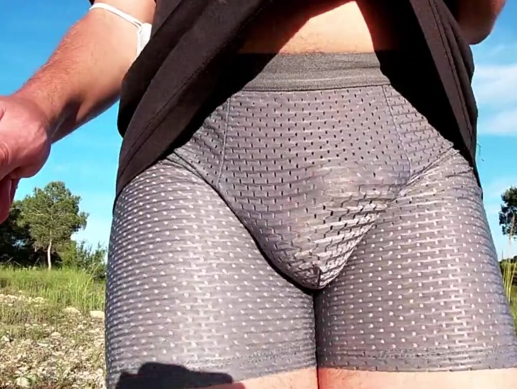 Flashing my Bombshell dick into view thru shorts while the runners go by