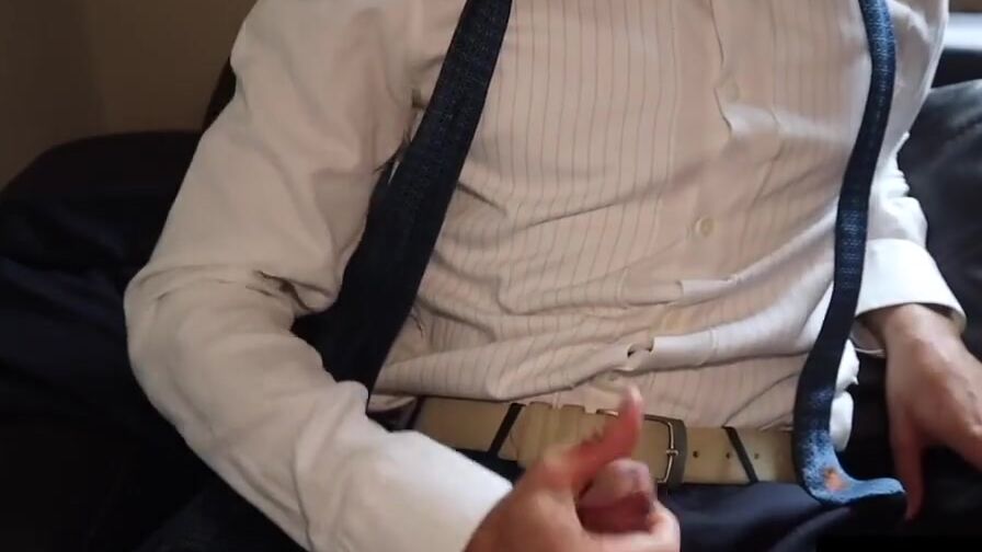 Jerking off my dick inside suit during work on office sofa