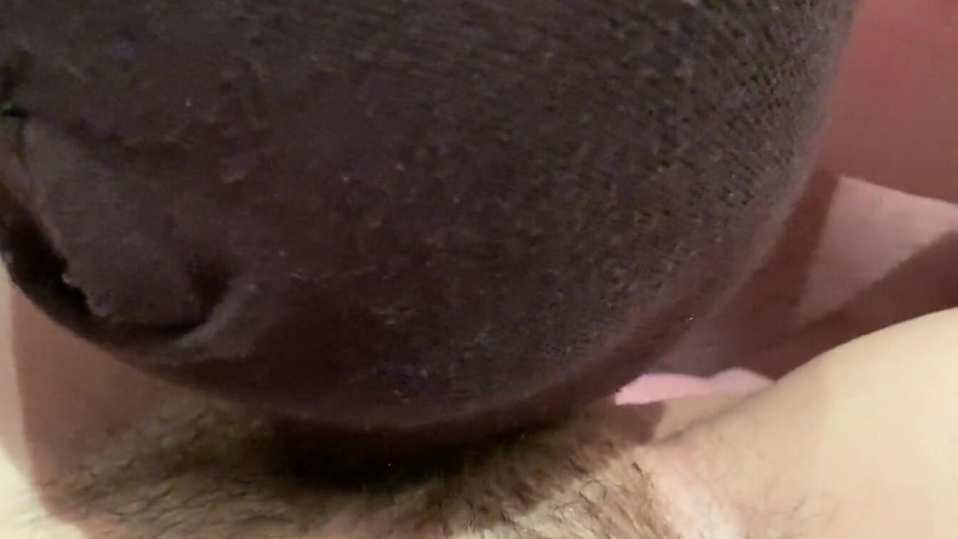 Licked bushy cunt close-up