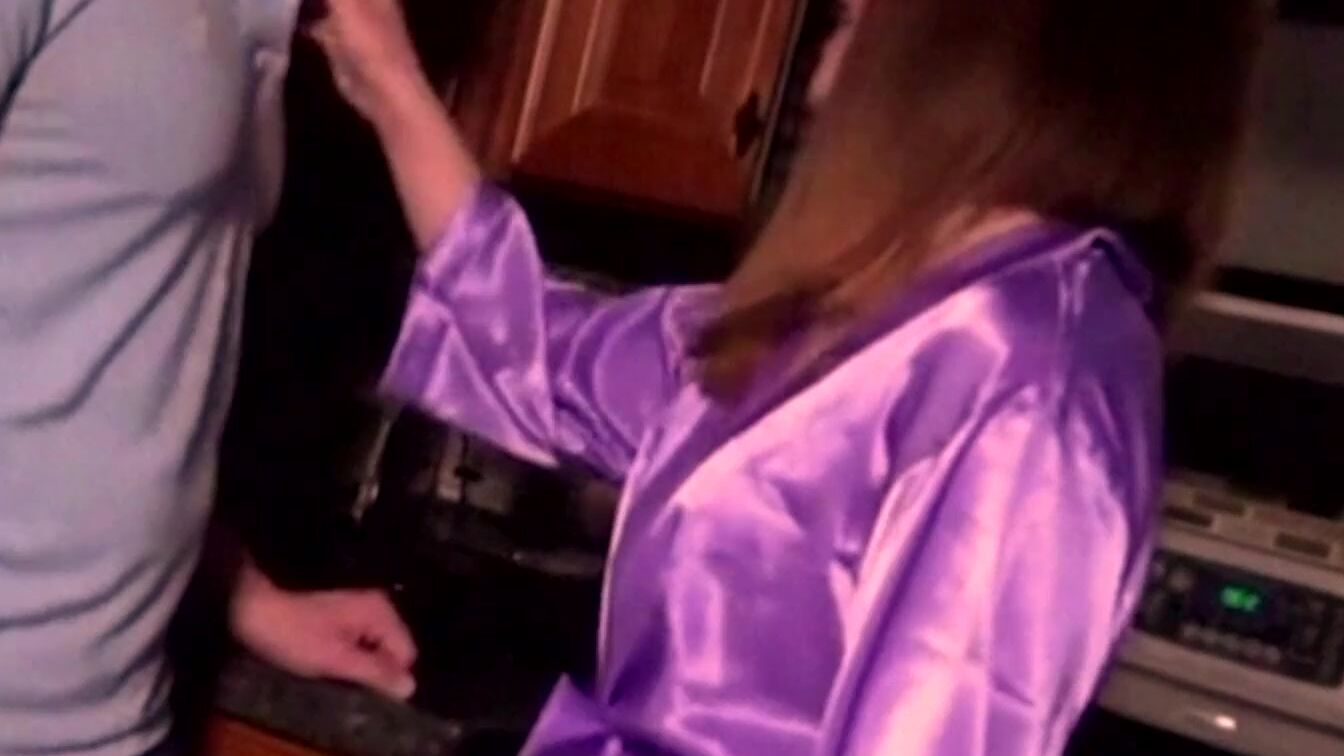 Bombshell Stepmom walks around with a open robe